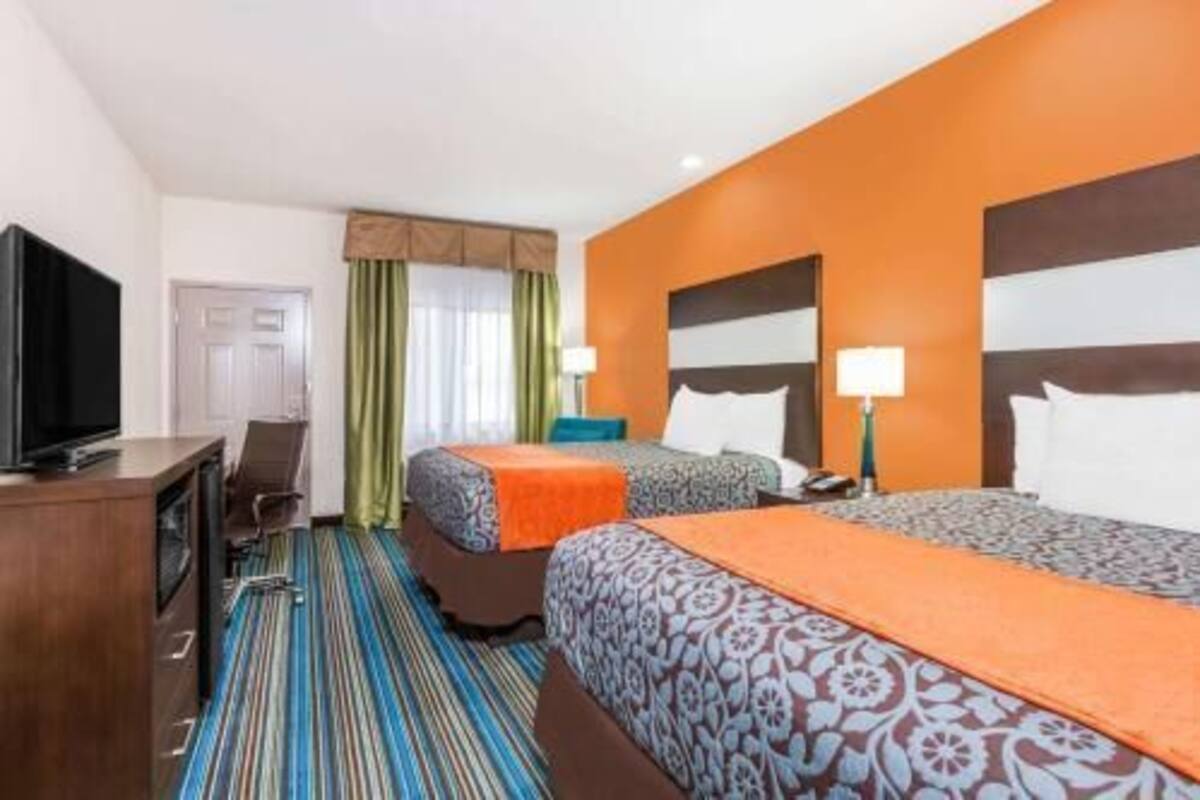 Premium bedding, desk, laptop workspace, iron/ironing board