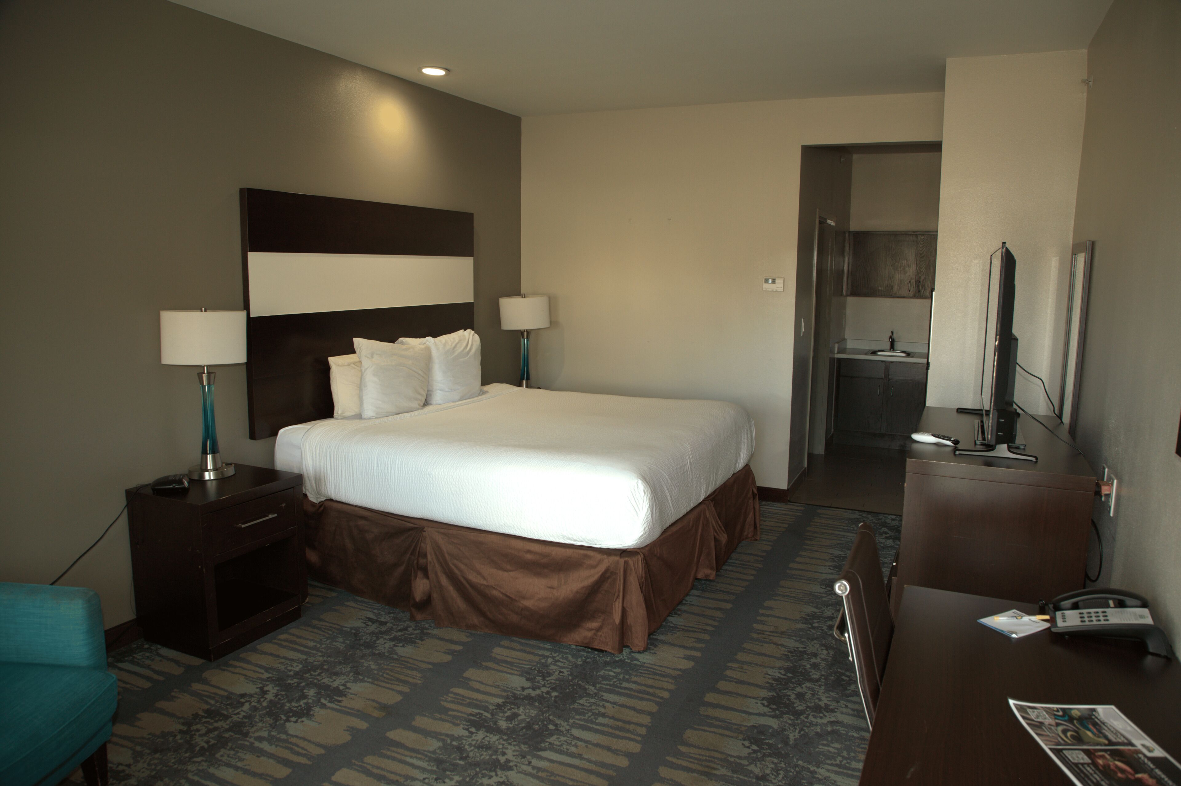 premium bedding, desk, laptop workspace, iron/ironing board