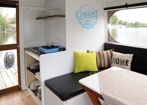 Family Cabin, 1 Bedroom, Non Smoking, Lake View | Private kitchen | Stovetop, electric kettle, cookware/dishes/utensils, dining tables - HAVEL Cruiser (Brandenburg an der Havel)