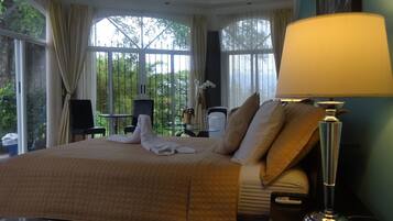Deluxe Quadruple Room, Pool Access, Golf View | Minibar, in-room safe, laptop workspace, free WiFi