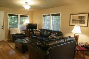 Parker Cottage (Pet-Friendly) | Living room | DVD player - The Farm Cabins (Candler)