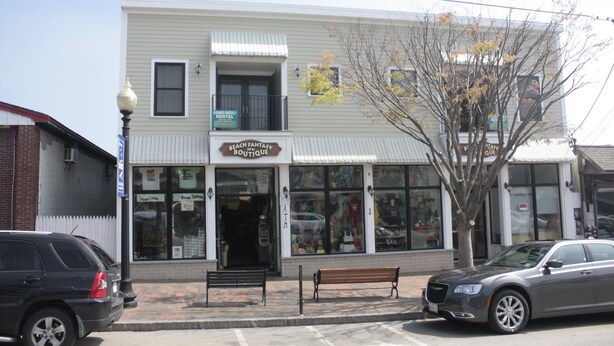 A building with a sign reading "Beach Fantasy Boutique."