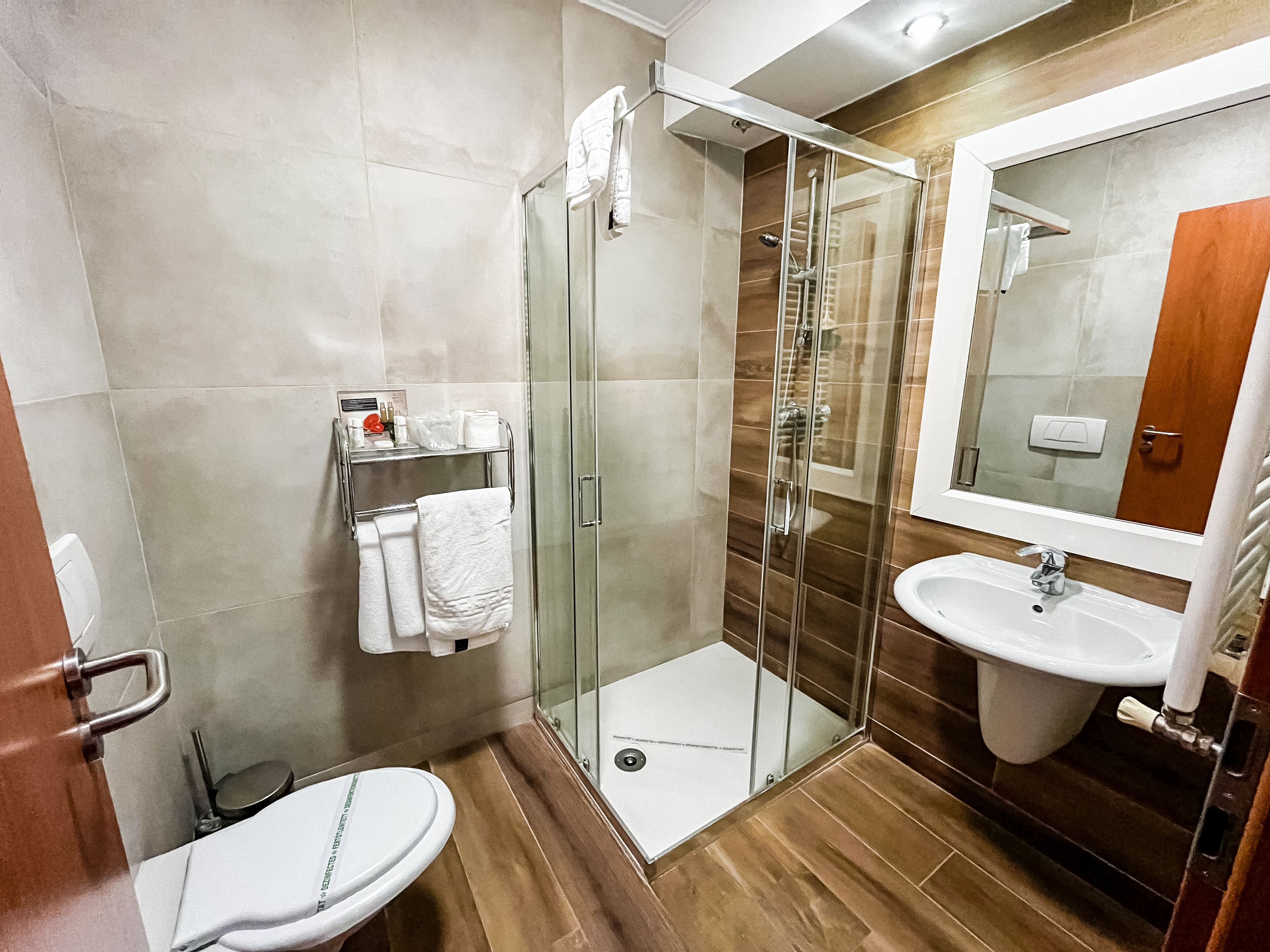 basic room with armchair triple use | bathroom | free toiletries, hair dryer, bathrobes, slippers