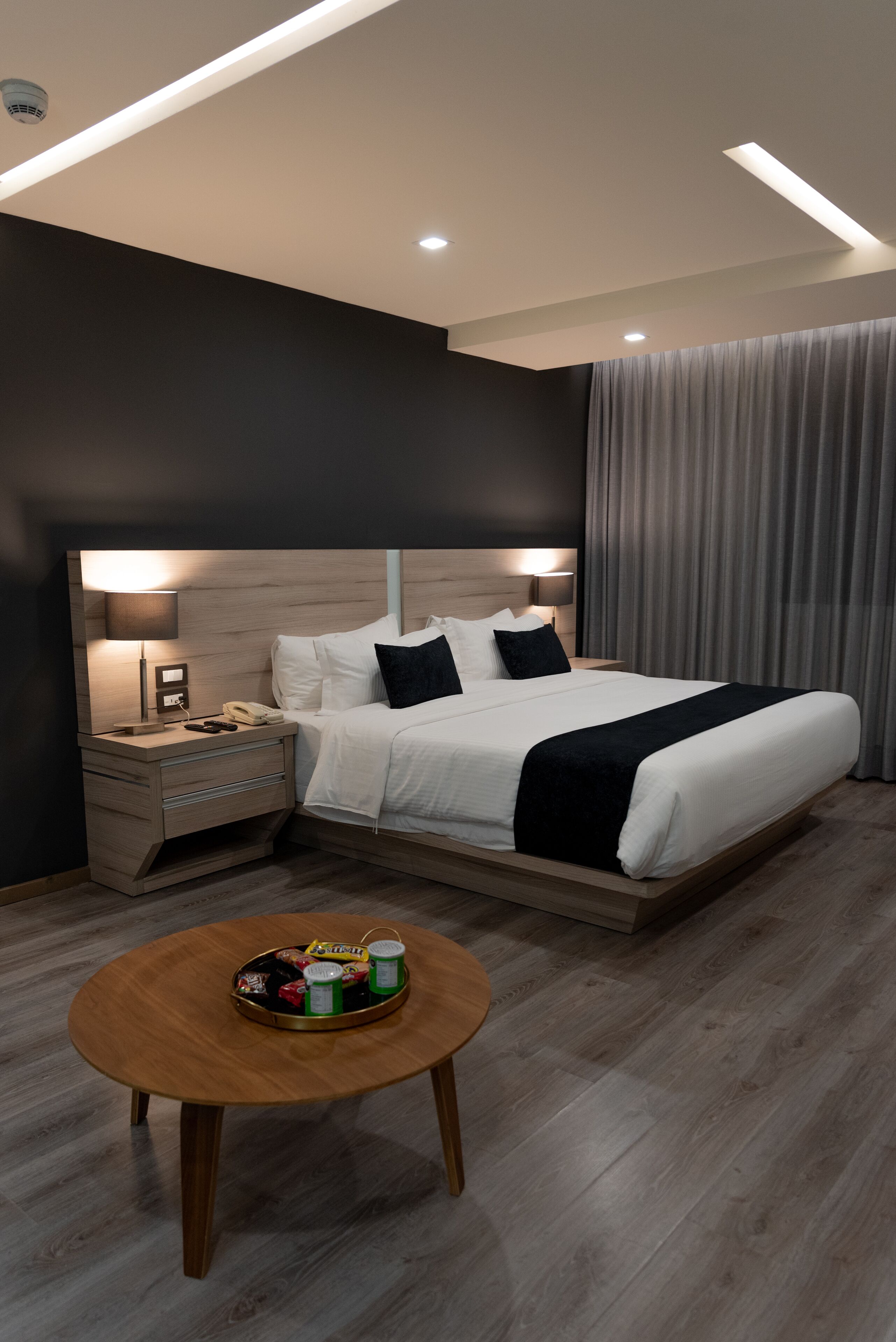 junior suite | in-room safe, desk, soundproofing, iron/ironing board