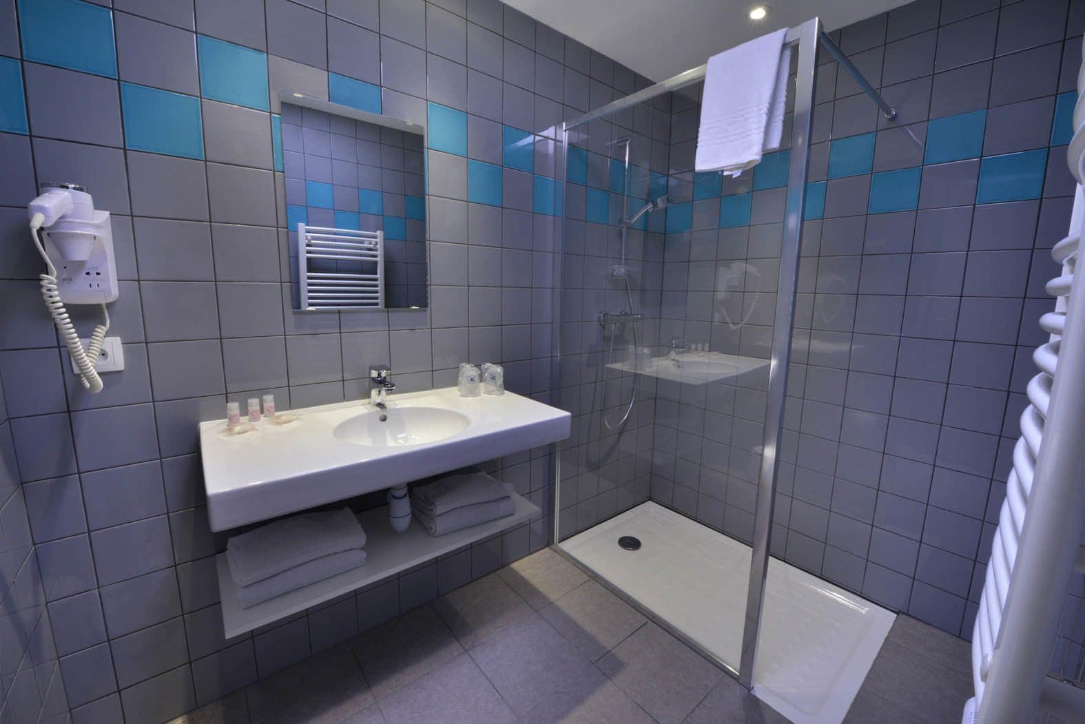 quadruple room | bathroom | shower, rainfall showerhead, free toiletries, hair dryer