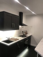 Superior Apartment (Dunstanburgh, First Floor) | Living area | 40-inch flat-screen TV with digital channels, LCD TV, DVD player