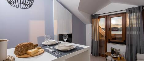 Design Apartment, 1 Bedroom, Sea View (Top Floor) | Living area | Flat-screen TV