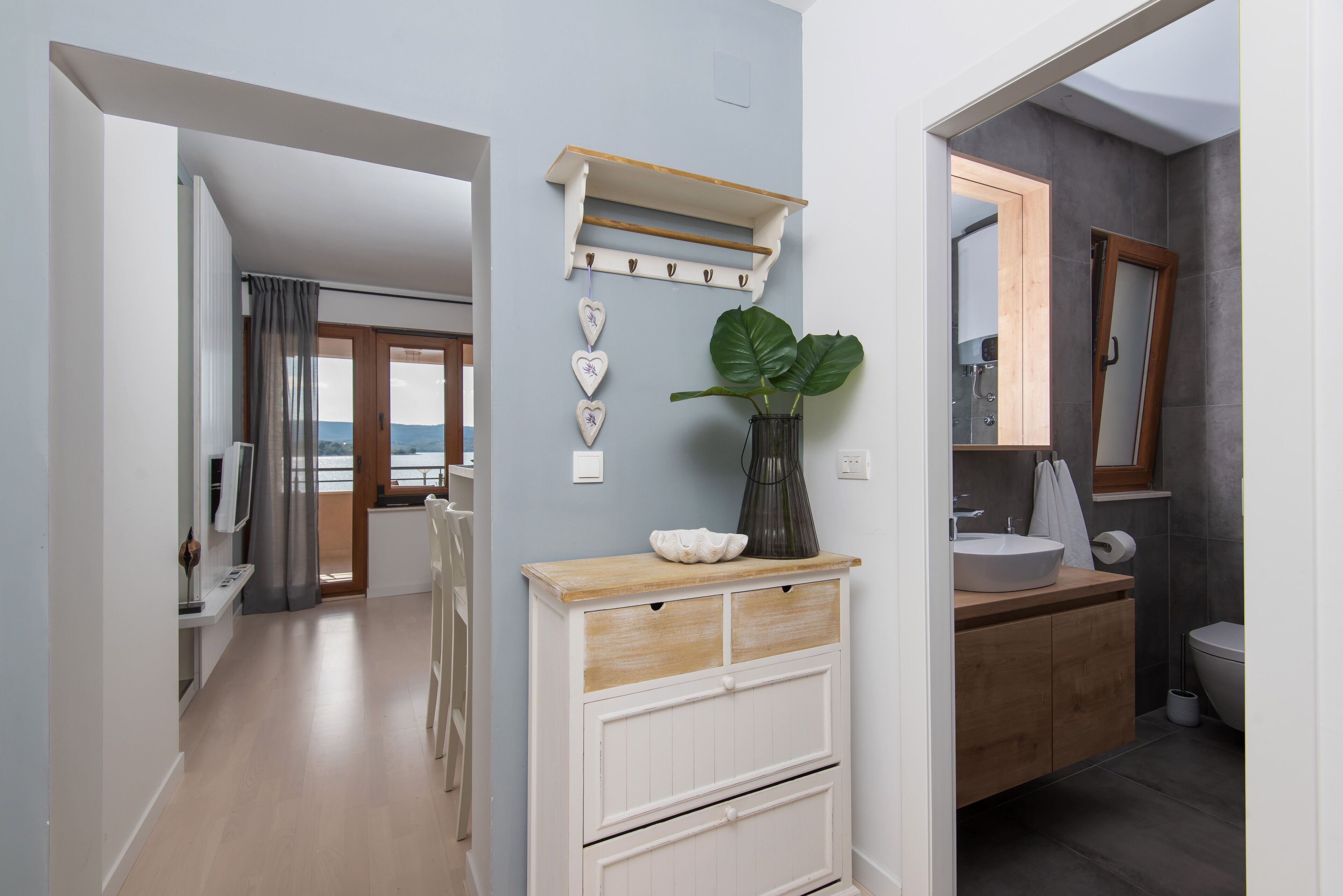 exclusive apartment, 1 bedroom, sea view | living area | flat-screen tv