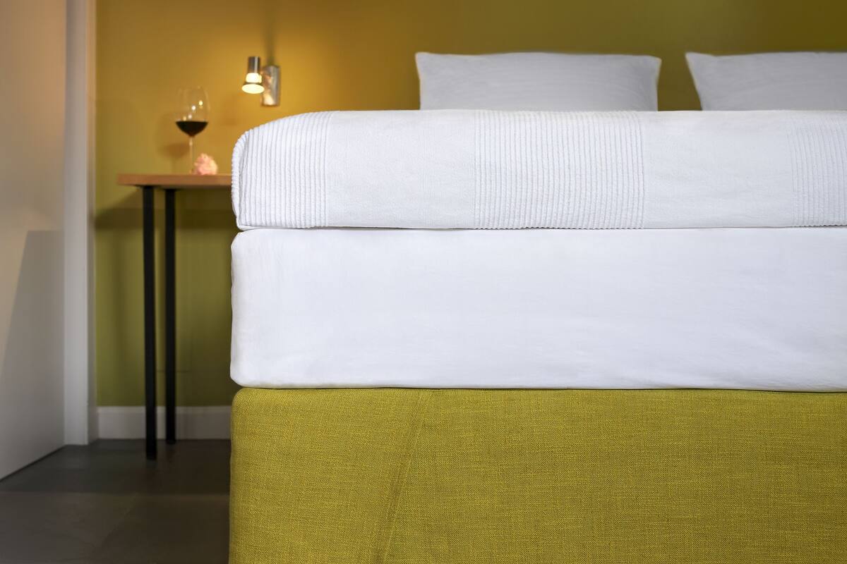 deluxe room, garden view | premium bedding, minibar, desk, blackout curtains