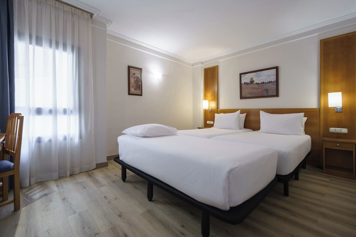 Standard Triple Room (Extra Bed) | 1 bedroom, minibar, in-room safe, desk