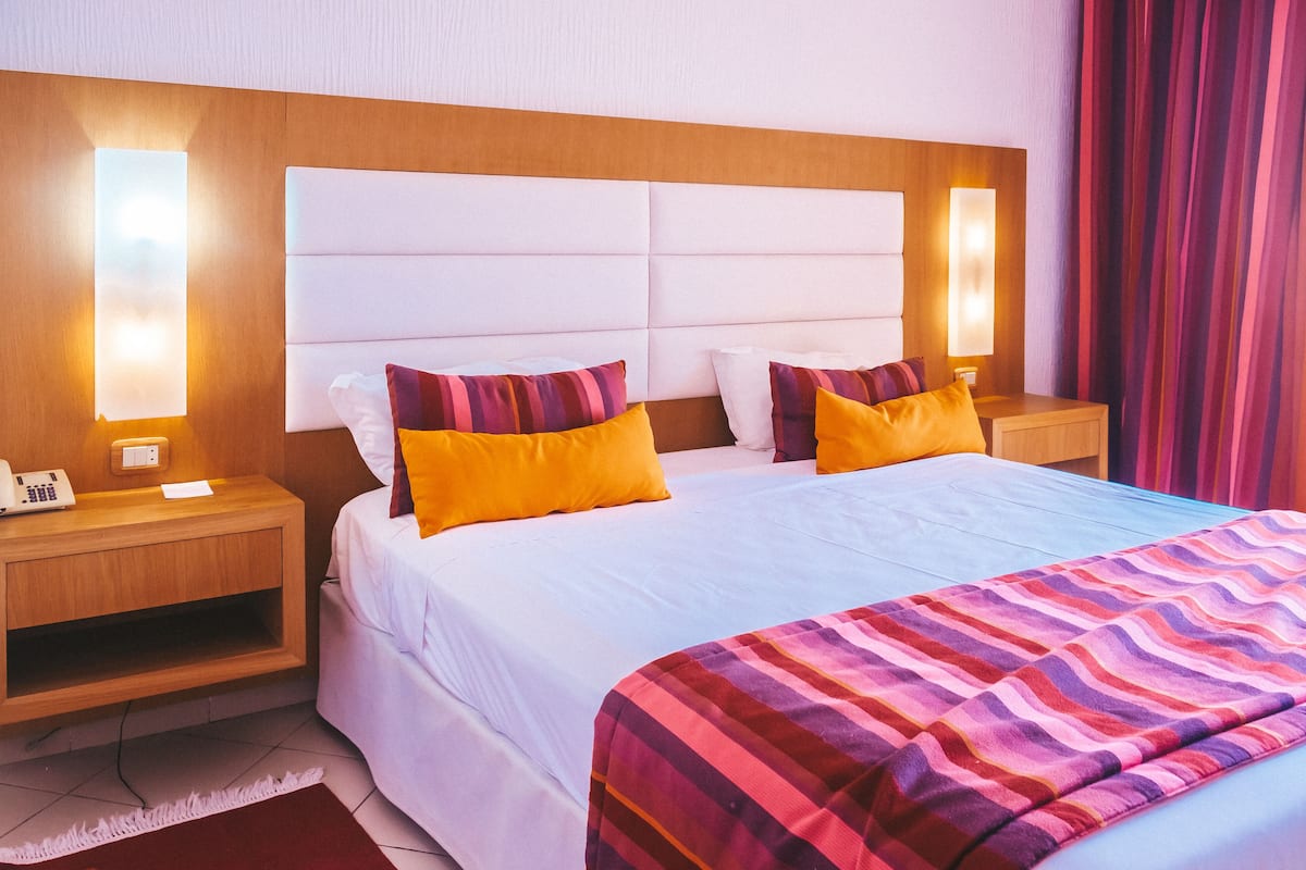 minibar, in-room safe, blackout curtains, bed sheets