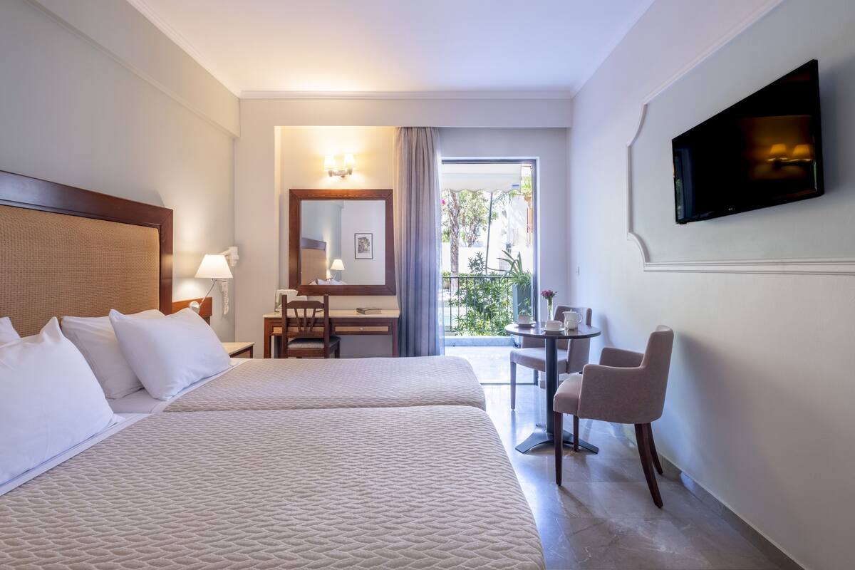 double or twin room, balcony, garden view | in-room safe, free cots/infant beds, free wifi, bed sheets