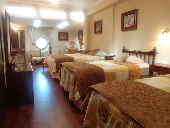 Triple Room | In-room safe, desk, iron/ironing board, rollaway beds