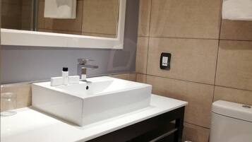 Shower, free toiletries, towels, soap