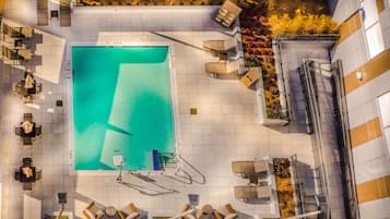 Outdoor pool, open 10:00 AM to 8:00 PM, pool umbrellas, pool loungers
