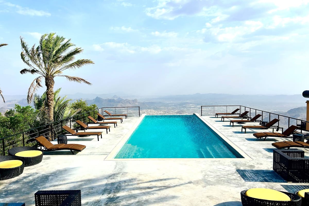 outdoor pool, pool loungers