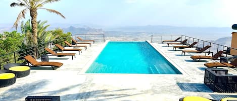 Outdoor pool, sun loungers