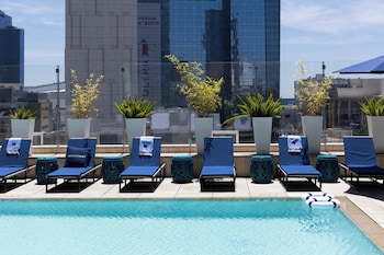 Outdoor pool, free cabanas, pool umbrellas at Hotel Indigo Los Angeles Downtown by IHG