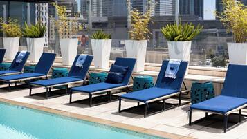 Outdoor pool, free cabanas, pool umbrellas