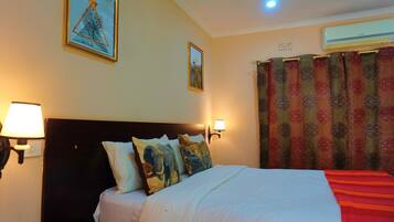 Kamar Double atau Twin Deluks, 1 Tempat Tidur Double atau 2 Tempat Tidur Twin | Brankas dan didekorasi berbeda-beda