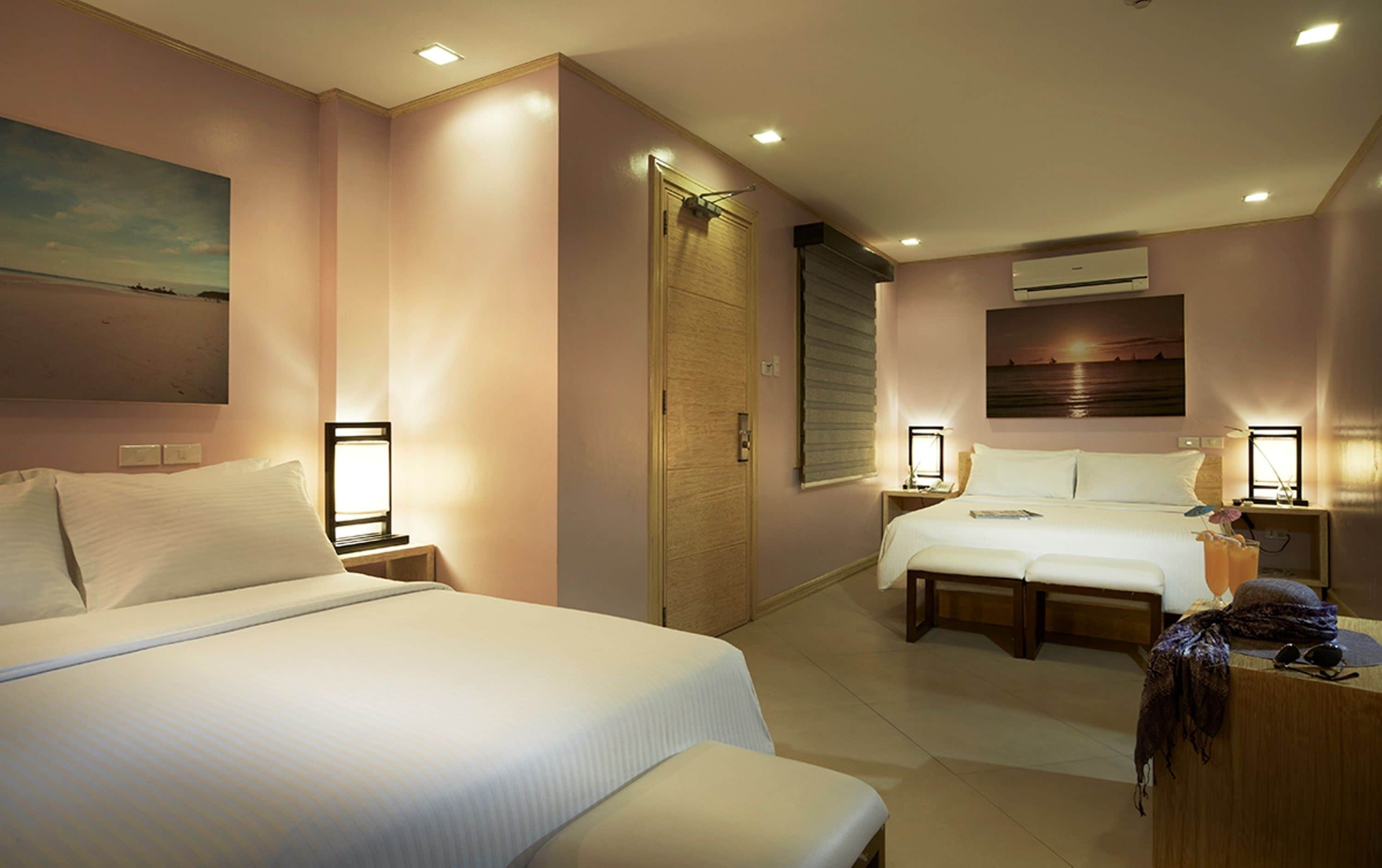 family room | 1 bedroom, premium bedding, minibar, in-room safe