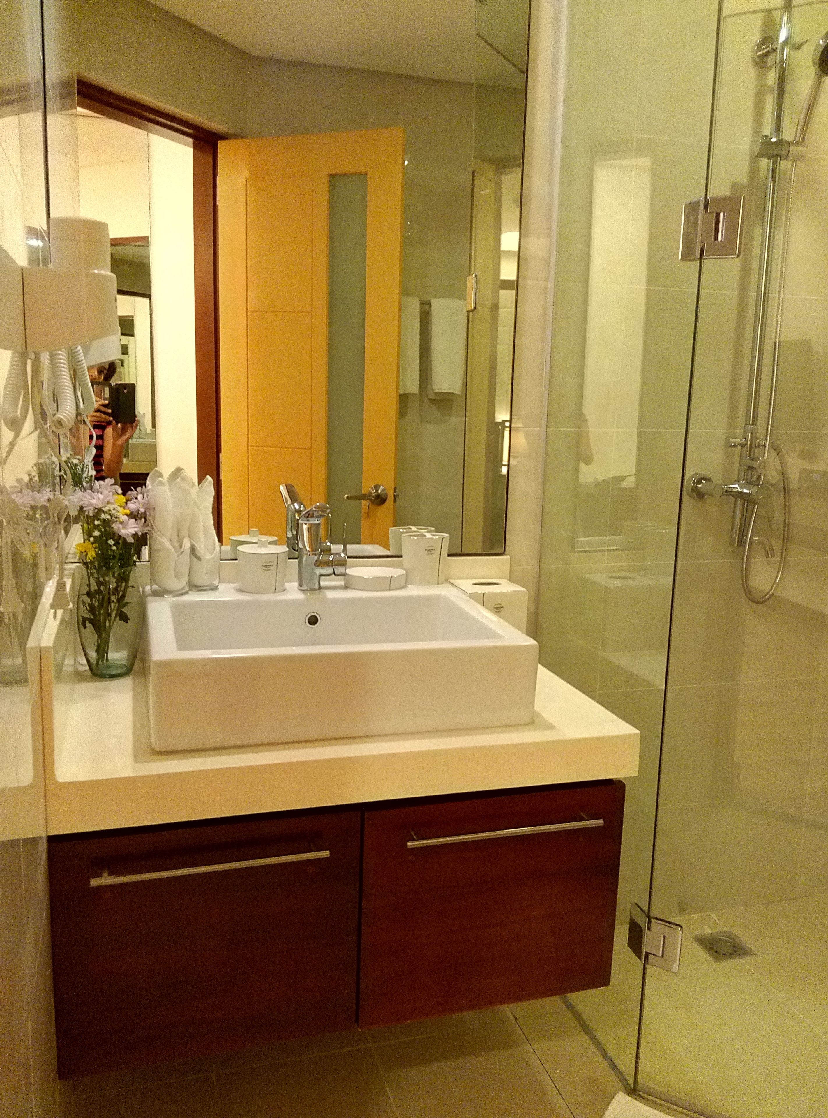 beachfront pad | bathroom | shower, rainfall showerhead, free toiletries, slippers