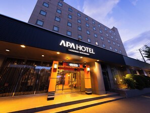 The exterior of the APA HOTEL with a modern design, featuring a prominent entrance and a large sign above the doors. - APA Hotel Aomori Eki Kenchodori (Aomori)