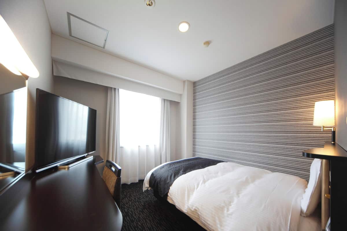 Desk, blackout curtains, free WiFi, bed sheets