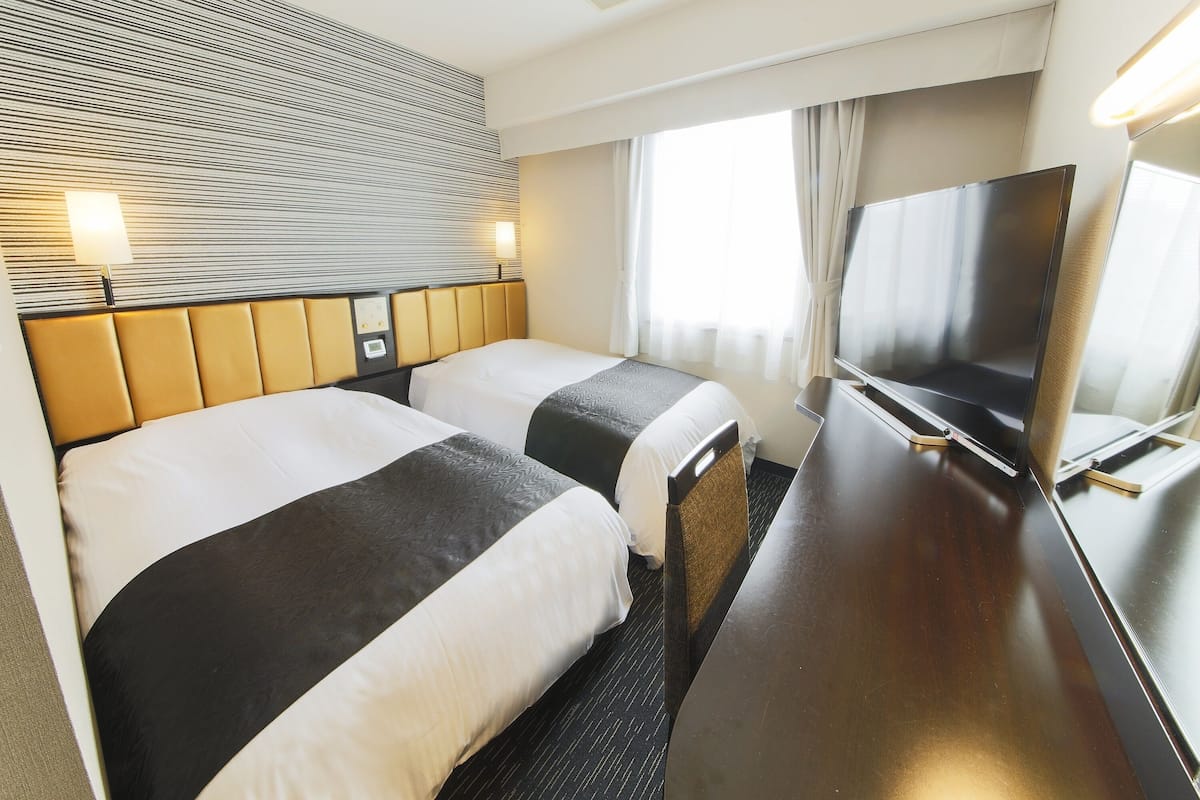 Desk, blackout curtains, free WiFi, bed sheets