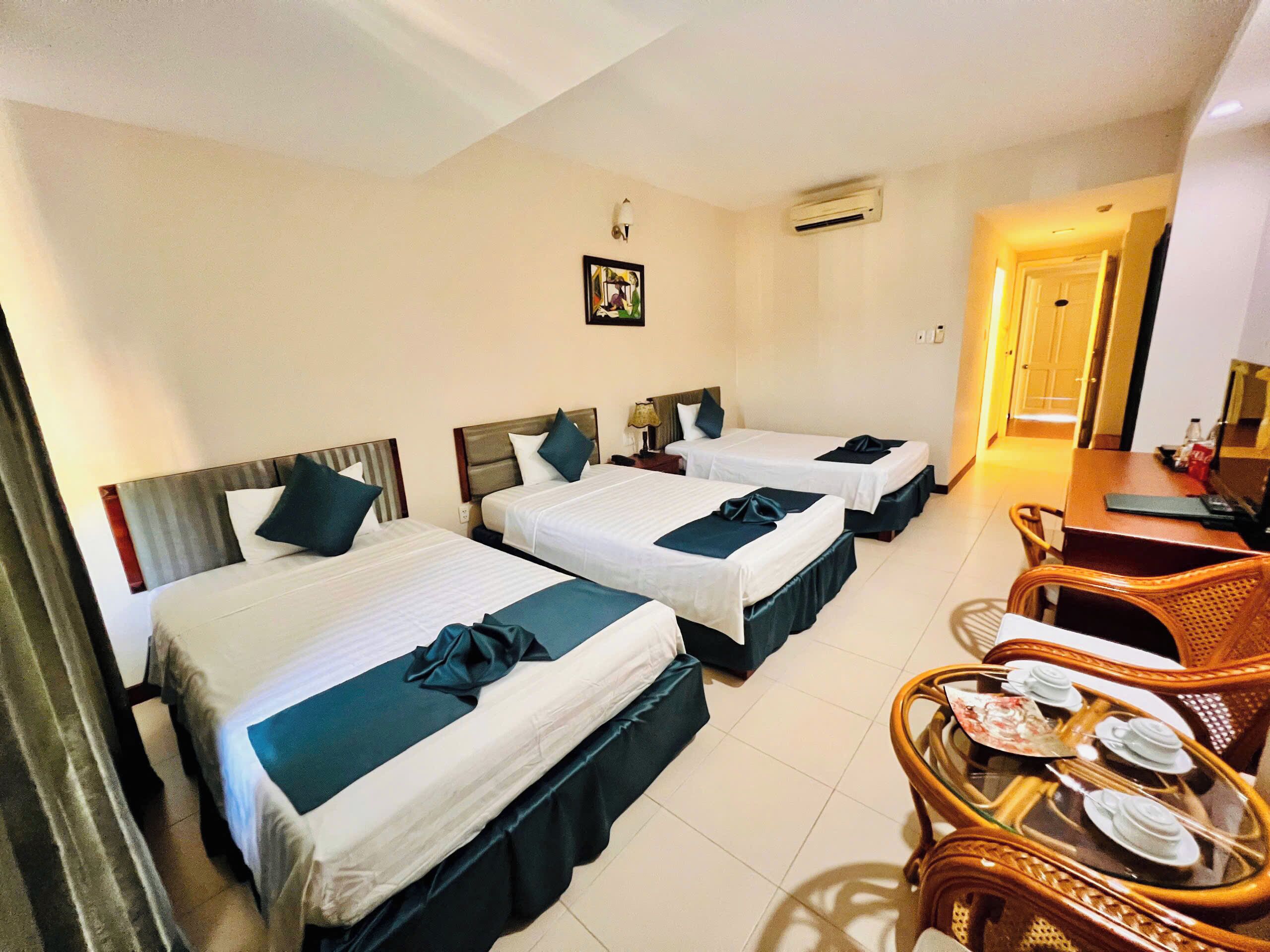 Tripla Deluxe, vista montagna | Minibar, una cassaforte in camera, una scrivania, postazione laptop