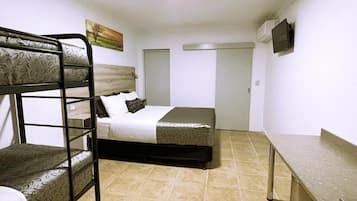 Premium bedding, desk, laptop workspace, blackout curtains