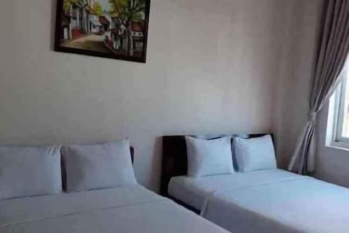 Desk, laptop workspace, blackout drapes, soundproofing