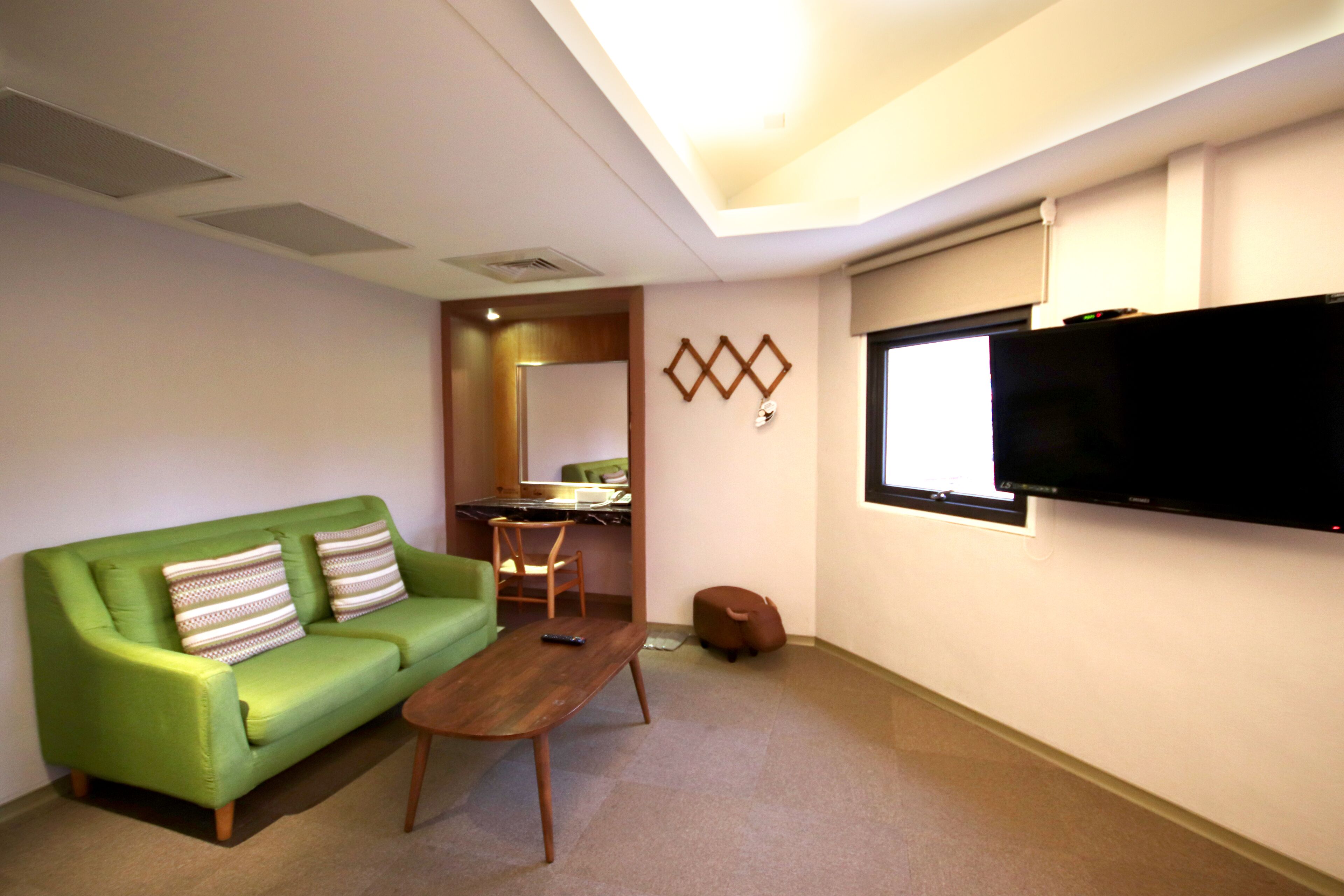 family quadruple room | living area | led tv