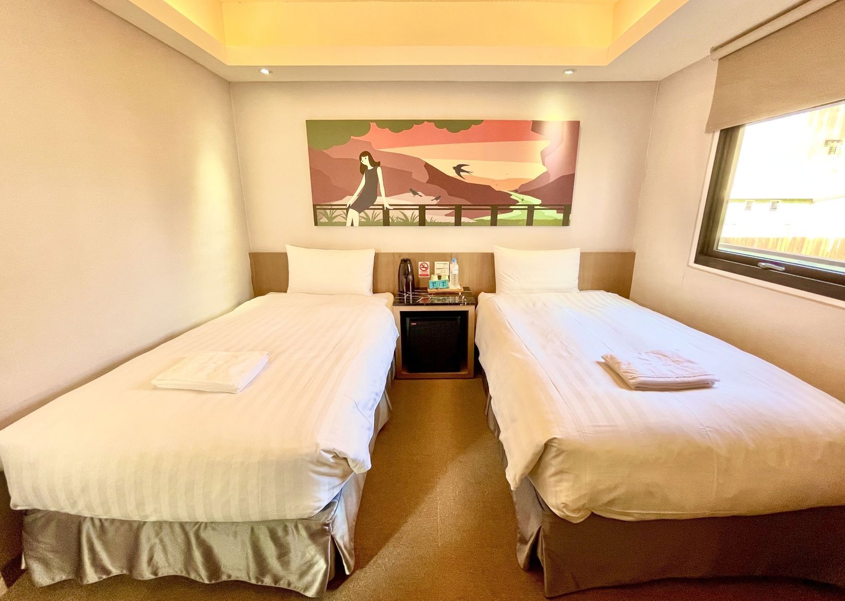 Premium bedding, desk, blackout drapes, soundproofing