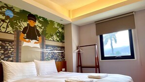 A neatly made bed with white linens and towels, a window with a view of palm trees, and a wall mural of a person with a bird.