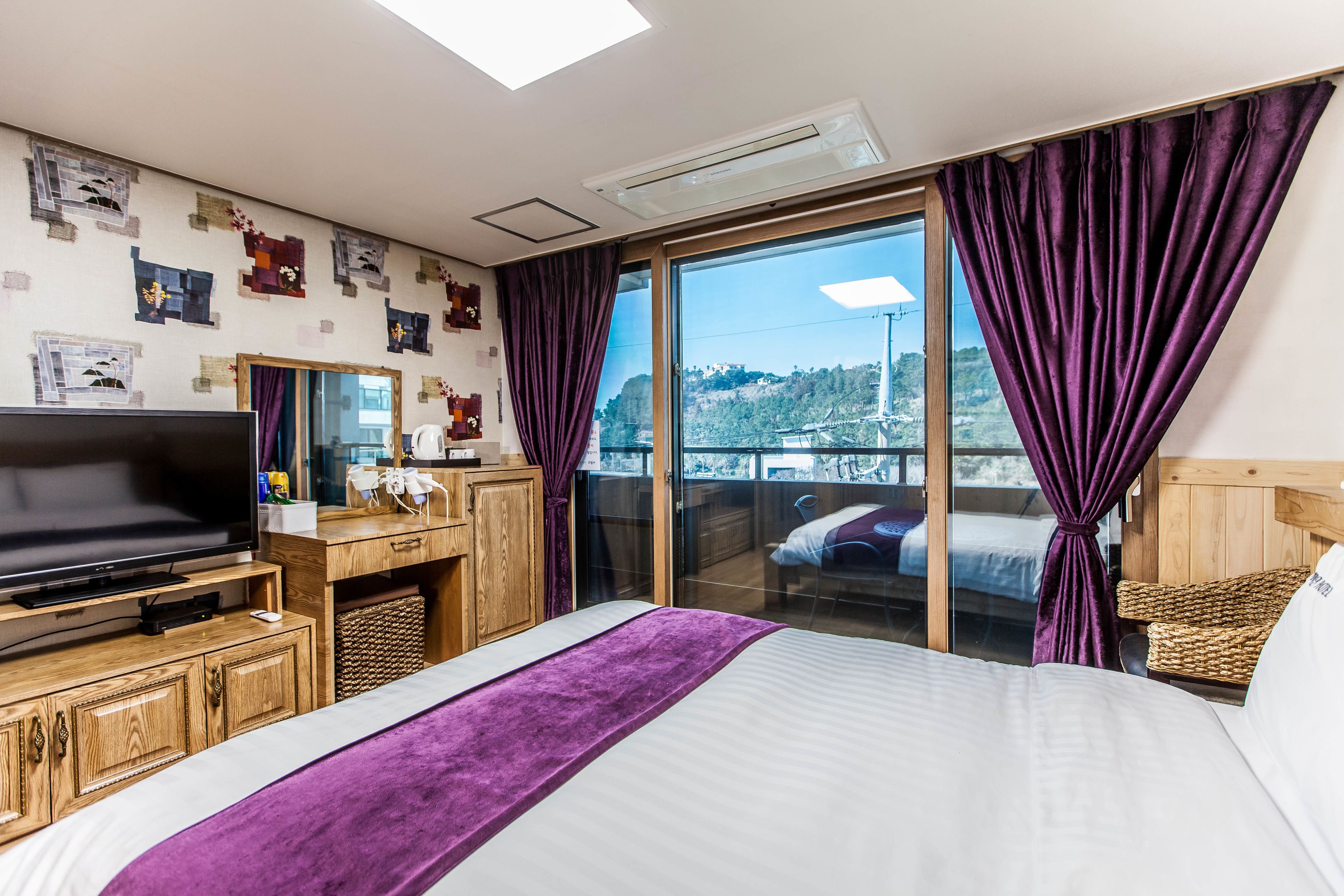 Premium bedding, down duvets, desk, laptop workspace