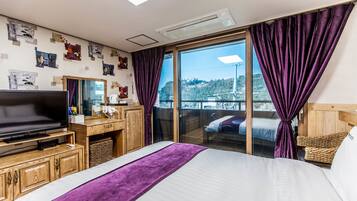 Premium bedding, down duvets, desk, laptop workspace