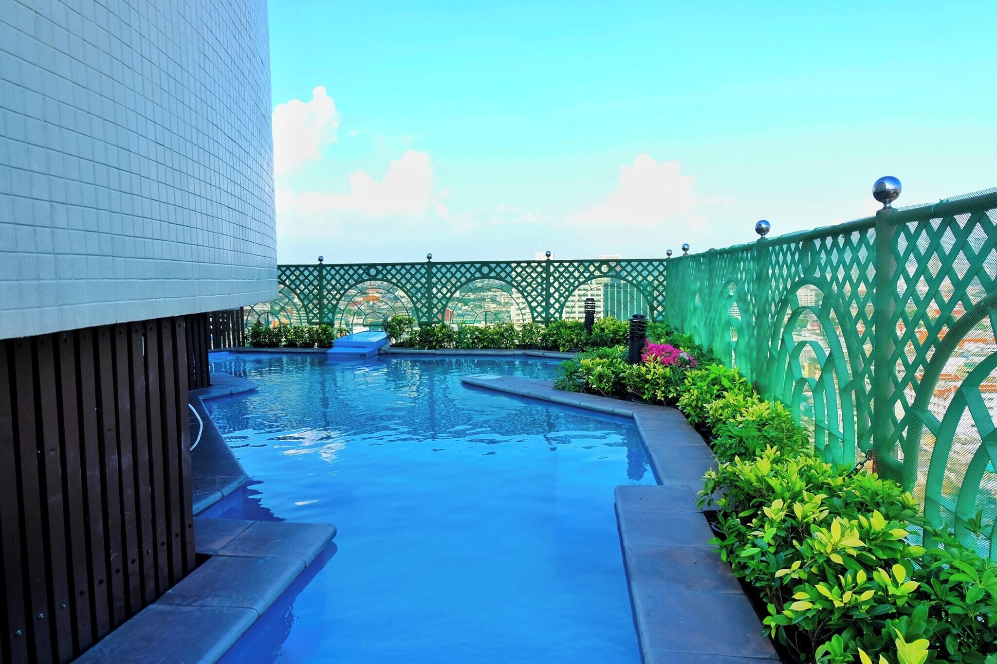 Outdoor pool, open 8:00 AM to 6:00 PM, pool umbrellas