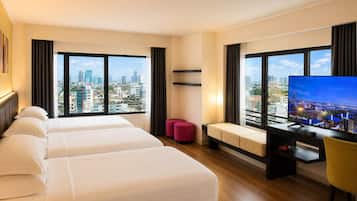 Junior Suite, City View | Minibar, in-room safe, desk, soundproofing