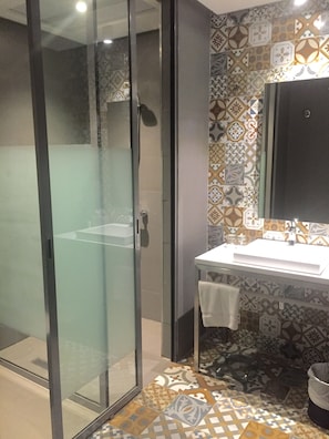 Shower, eco-friendly toiletries, towels, soap