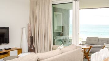 Luxury Apartment, 3 Bedrooms, Ocean View | Living area | LCD TV, DVD player, iPod dock