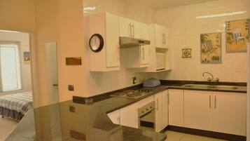 Apartment 37 - Six Sleeper Patio Lake | Private kitchen | Full-size fridge, microwave, stovetop, coffee/tea maker
