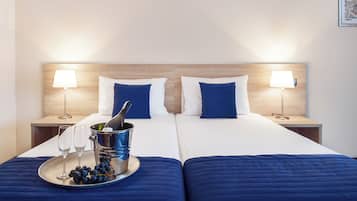 Premium bedding, down duvets, in-room safe, desk