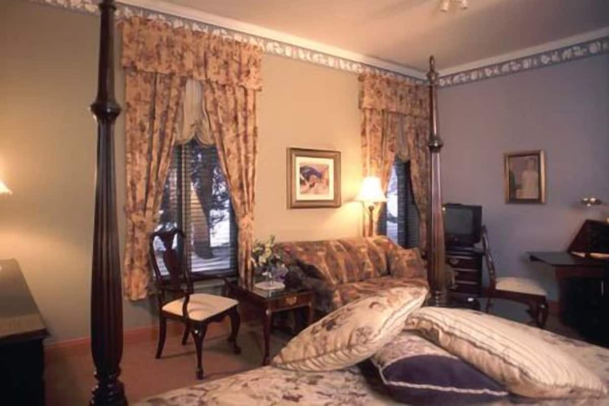 Habitación superior, 1 cama de matrimonio con sofá cama | Zona de estar