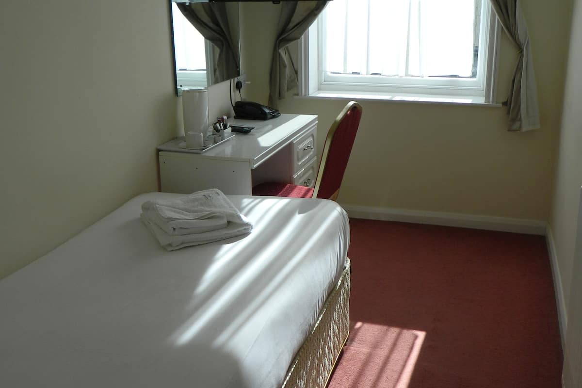 Desk, soundproofing, iron/ironing board (on request), bed sheets