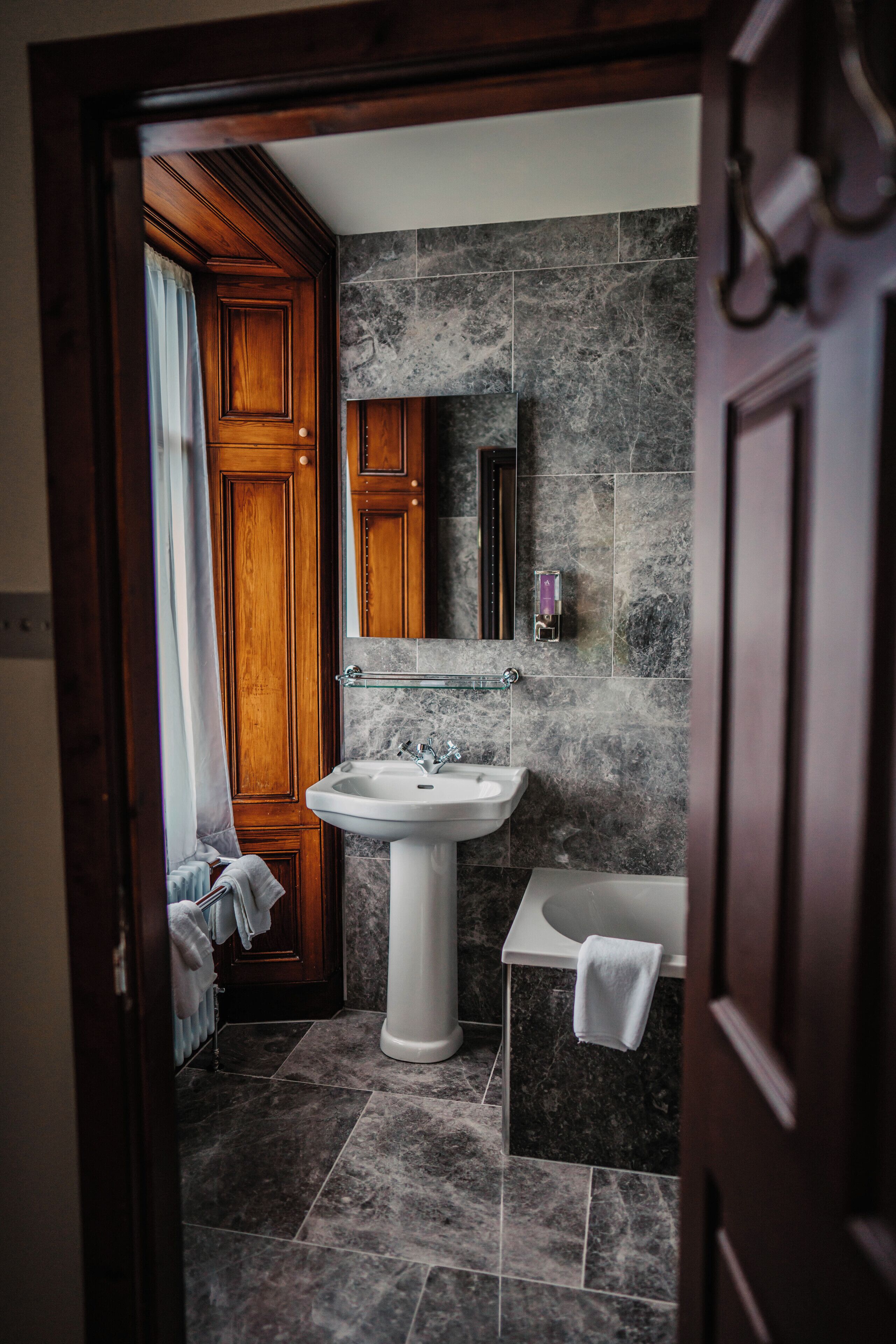 superior double room | bathroom | hair dryer, bathrobes, slippers, towels