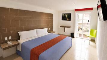 Suite superior, 1 cama King size | Ropa de cama de alta calidad y caja de seguridad en la habitación
