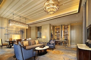 A spacious lobby with a modern chandelier, comfortable seating, and a well-organized reception desk. - Wanda Realm Fuyang (Fuyang)