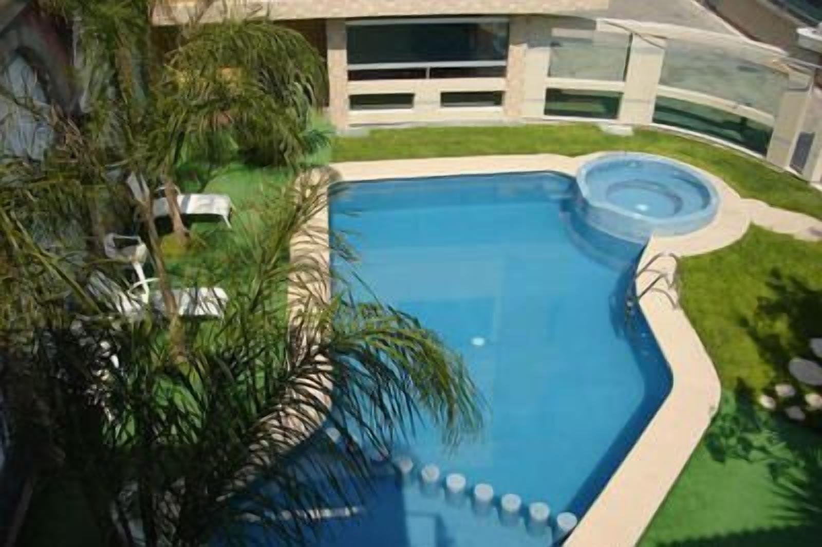 outdoor pool, pool loungers