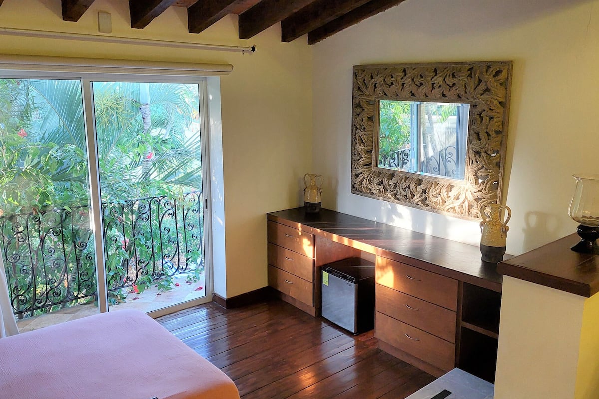 premium room, pool view | premium bedding, in-room safe, blackout curtains, iron/ironing board